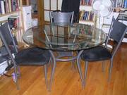 Glass and metal dining table and chairs